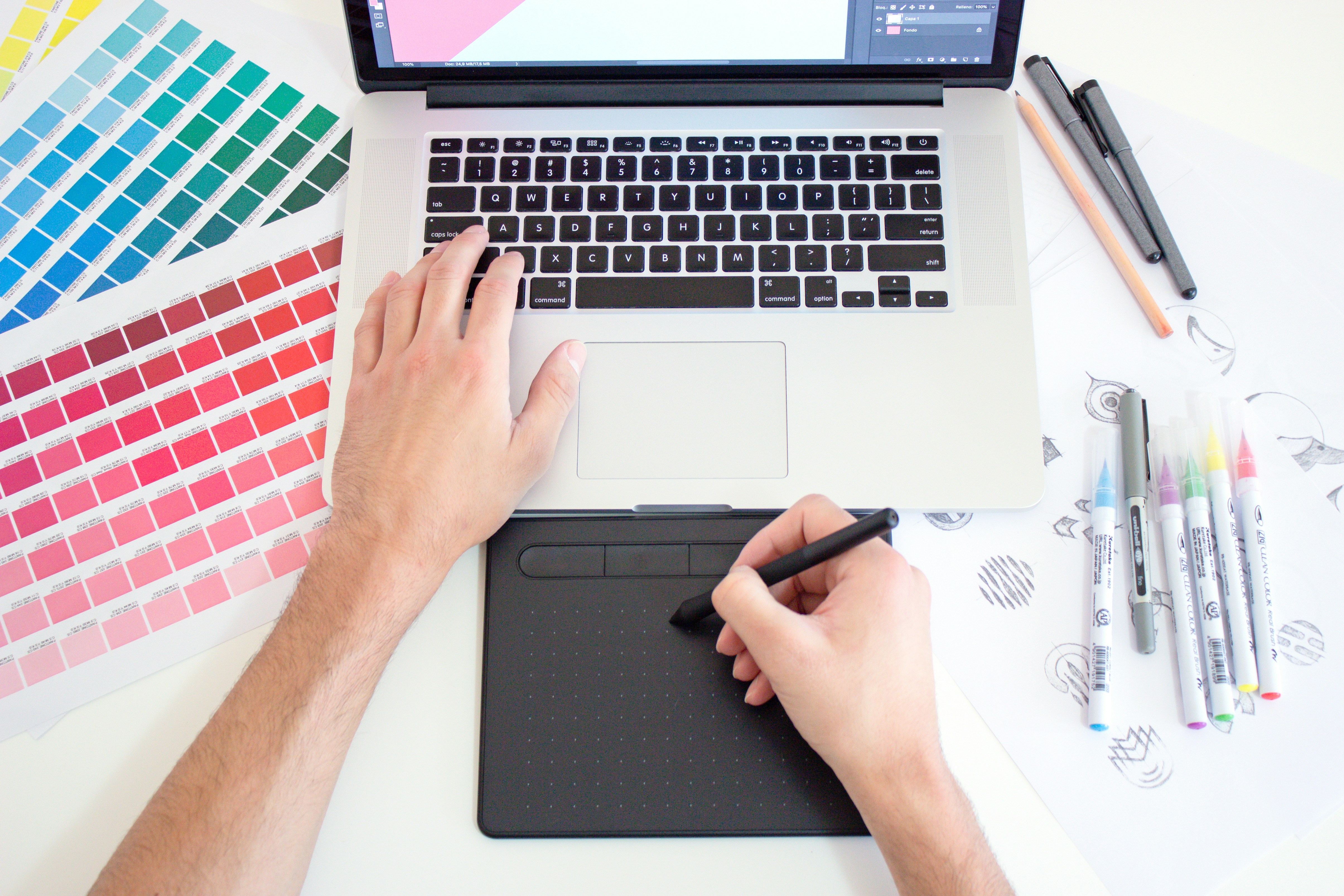 Designer reviews interface colors and visual states while checking website accessibility contrast.